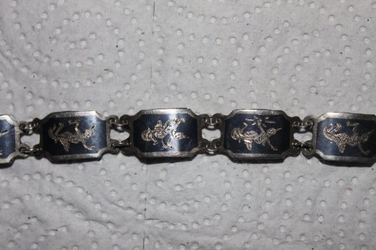 Sølv armbånd med Thailandske motiver
